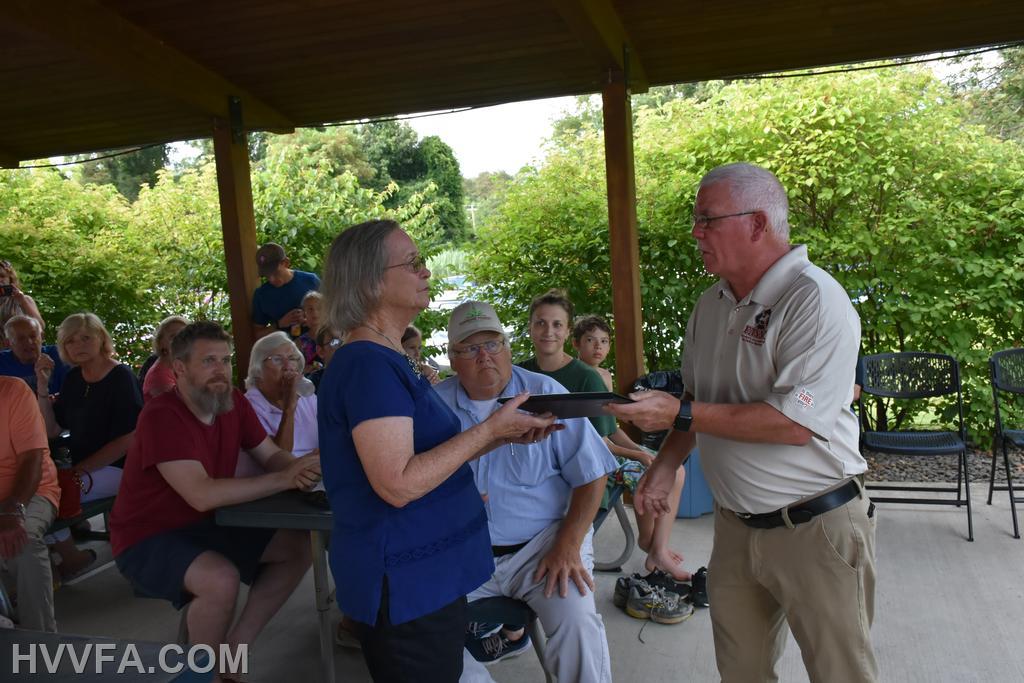 FaASNY Director Don Farrell Presenting a certificate to Diane Hickman for 53 years